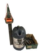 A MacAlister wet and dry vacuum and a Black & Decker hedge trimmer.