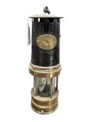 A 19th century Patterson Lamps Gateshead on Tyne brass and steel miner's safety lamp.