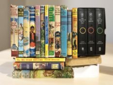 A group of volumes to include a Lord of the Rings trilogy box set, together with Enid Blyton,