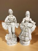 A pair of Capodimonte porcelain figures