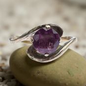 A 9ct gold amethyst solitaire ring, size L CONDITION REPORT: 1.