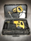 A Dewalt 567-GB drill and a further 570 drill
