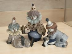 Three Lladro figures of clowns, No. 5278, 5812 and 5813.