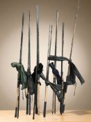 A group of fishing rods with bags including Shakespeare, Sensilite, Odessa, etc.