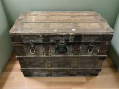 A 19th century canvas and metal bound dome topped chest, width 77 cm.
