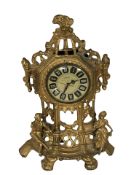 An ornate gilt metal quartz mantel timepiece signed 'Mercedes', height 36 cm.