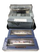 A group of die cast scale model battle ships and boats including WWII ships,