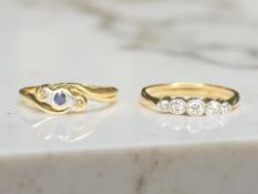 An 18ct gold and platinum crossover ring (a/f), and a further five stone diamond ring, marks rubbed.