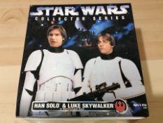 A Kenner Star Wars Collector Series Han Solo and Luke Skywalker in Storm Trooper Gear,