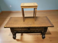 A reproduction oak two drawer low coffee table, width 114 cm,