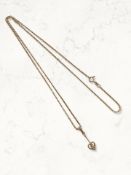 A diamond-set heart pendant on 9ct gold chain CONDITION REPORT: 6.