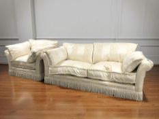 A contemporary four piece lounge suite comprising of three seater settee,