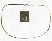 A 9ct gold flat-link necklace and a matching pair of earrings CONDITION REPORT: 5.