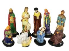 A group of composition nativity figures.