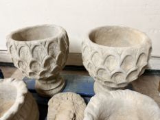 A pair of concrete garden pineapple planters, height 47 cm.