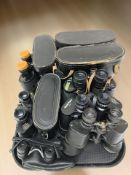 Six pairs of binoculars including Swift, Turners,