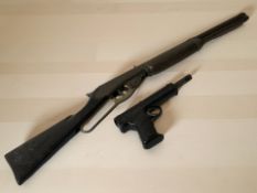 A vintage child's toy lever action rifle and a Diana SP50 air pistol.