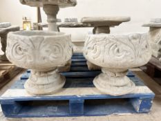 A pair of concrete garden planters, height 39 cm.