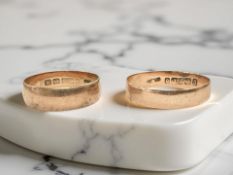 Two 9ct gold band rings (one misshapen, the other size P) CONDITION REPORT: 4.