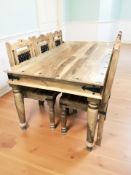 A sheesham wood dining table, 175 cm x 92 cm x 76 cm, and a matching set of six dining chairs.