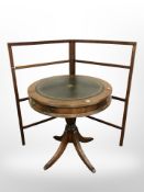 A reproduction mahogany drum occasional table, diameter 61 cm, together with a towel rail.