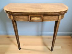 An Edwardian mahogany and satinwood inlaid D-shaped turnover topped card table, width 91 cm.