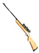 A BSA Meteor break action .22 calibre air rifle, with SMK 4x32 telescopic sight.