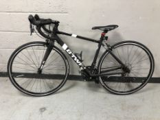 A B-Twin triban 500 road bike,