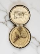 An Edwardian 9ct gold aquamarine and seed pearl pendant,