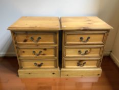 A pair of modern pine three drawer bedside chests, width 49 cm.