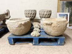 A pair of concrete garden planters, height 30 cm.