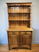 A 20th century pine dresser, 97 cm x 43 cm x 176 cm.