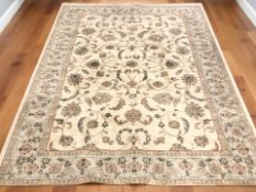 A machine made carpet of Iranian Isfahan design, 292 cm x 200 cm.