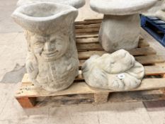 A concrete toby jug planter, height 43 cm, together with a lion mask ornament.