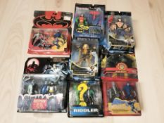A group of boxed Batman figurines including Kenner.