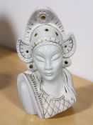 An oriental style gilt ceramic bust,