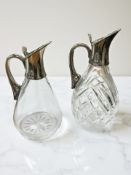 Two similar Victorian silver-mounted glass ewers, John Grinsell & Sons, London 1892,