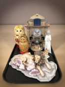 A Bradford Exchange Treasures of Ancient Egypt cuckoo clock, two Russian dolls,