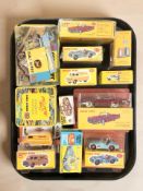 A collection of reproduction Corgi and Dinky boxed die cast vehicles