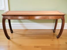 A contemporary Chinese hardwood altar / side table on bowed legs, 156 cm x 43 cm x 77 cm.