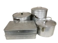 A group of aluminium catering pans