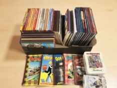 A collection of annuals including The Broons, The Beano, Oor Wullie, two related tins.