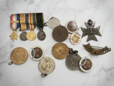 A WWI group of miniature medals, several coronation medals, Durham cap badge,