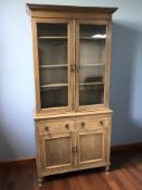 An early 20th century glazed oak double door bookcase, 100 cm x 37 cm x 212 cm.