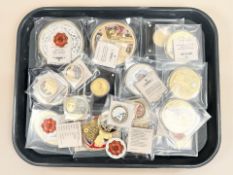 A collection of gold-plated commemorative coins and tokens, Royal Family, Battle of Britain,