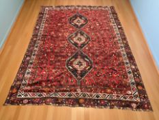 An Iranian Khamseh rug,