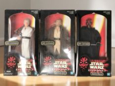 Three Hasbro Star Wars Episode I figures comprising Darth Maul, Qui-jon Jinn and Obi-Wan Kenobi,