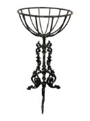 A painted cast iron plant stand,