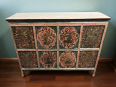 A late 19th century Chinese lacquered and painted elm four door sideboard, 117 cm x 36 cm x 93 cm.