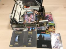 A group of Star Wars collectibles including special edition volumes and movie scripts,